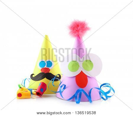 Funny birthday caps with decorative eyes isolated on white