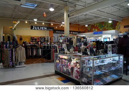 NAPERVILLE, ILLINOIS / UNITED STATES - NOVEMBER 3, 2015: Vendors offer clothing, toys and accessories for sale in the H Plaza in Naperville.