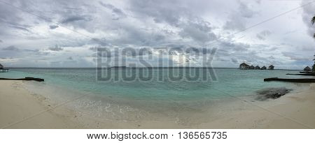 Maldive Beach Island resort landscape view of water bungalows