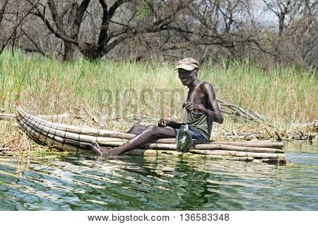 Fisherman Catches A Fish
