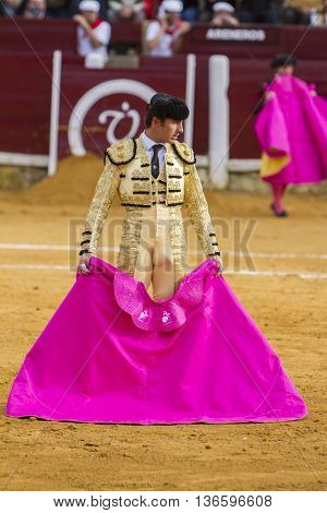 Ubeda Spain - October 4 2010: The Spanish Bullfighter El Fandi bullfighting with the crutch in the Bullring of Ubeda Spain