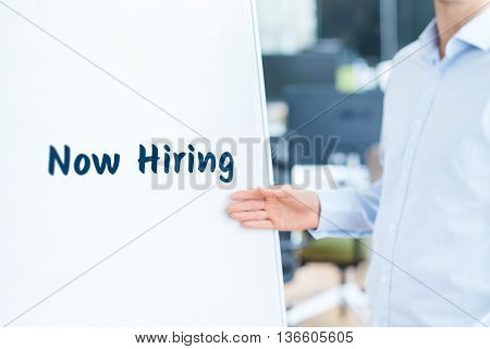 Businessman (recruiter HR staffer) attract new employees on company presentation - human resources concept.