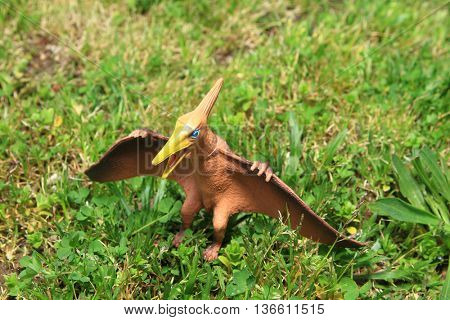 dinosaur in the grass