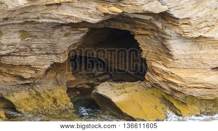 The entrance of a cave on Warrnambool's coastline in Victoria Australia.