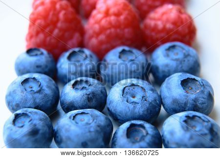 Closeup Of A Bunch Of Raspberries And Blueberries