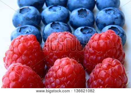 Closeup Of A Bunch Of Raspberries And Blueberries