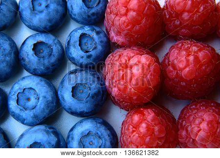 Closeup Of A Bunch Of Raspberries And Blueberries