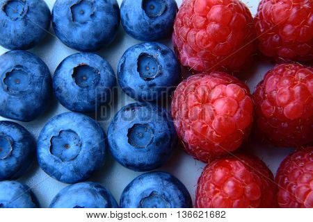 Closeup Of A Bunch Of Raspberries And Blueberries
