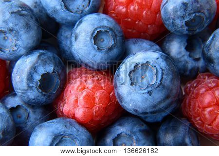 Closeup Of A Bunch Of Raspberries And Blueberries