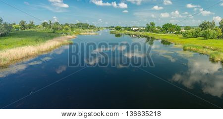 Summer panoramic landscape with small river Oril near Pekelne village in Ukraine