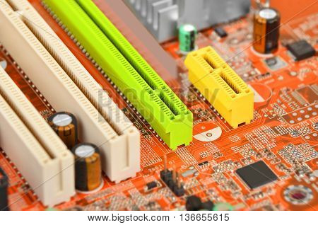 Printed computer motherboard with microcircuit close up DOF