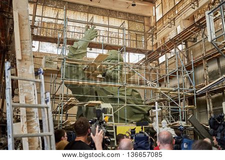 RUSSIA, MOSCOW - MAY 28, 2015: Press representatives near clay sculpture to St. Prince Vladimir during manufacture in the workshop of sculptor Salavat Shcherbakov.