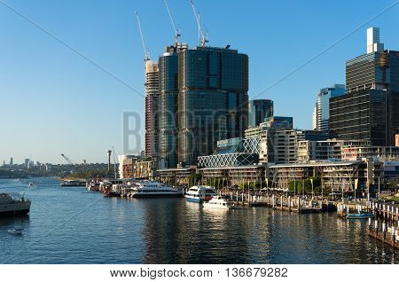 Sydney Australia - Mar 26 2016: Darling Harbour promenade with views of Barangaroo skyscrapers office buildings commercial and residential property