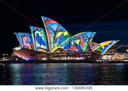 Sydney Australia - 2016 May 27: Annual outdoor lighting festival Vivid Sydney: Festival of Light Music and Ideas. Sydney Opera House illumination Lighting the Sails Songlines. Long Exposure