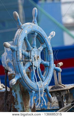 Cagliari: Rudder of an old boat docked in the dock of 