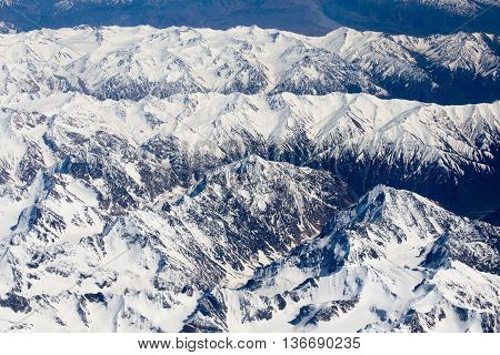 Aerial views in Tibet fly over to mountain Himalaya . View from the plane window