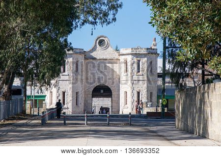 FREMANTLE,WA,AUSTRALIA-JUNE 1,2016:  View of the historic Fremantle Prison through the trees in Fremantle, Western Australia.