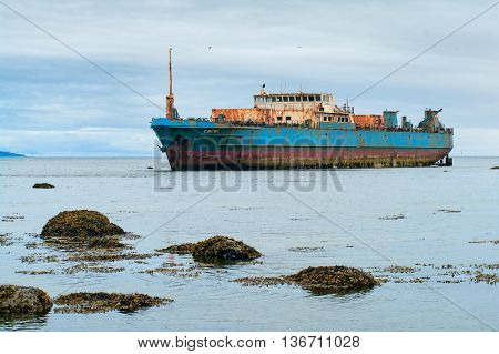 PARAMUSHIR RUSSIA - JULY 28 2012: Abandoned transport refrigerator 