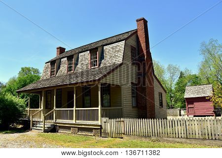 Bath North Carolina - April 25 2016: 1790 Van Der Veer Dutch colonial Home with gambrel roof and front porch