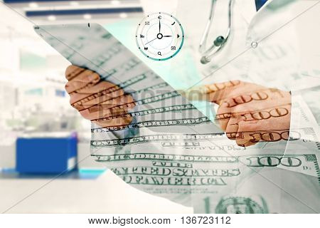 Doctor with tablet on blurred background, double exposition