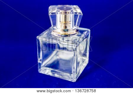 A bottle of perfume over white background