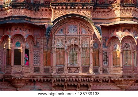 Woman At Window In Mehrangarh Fort In Jodhpur, Rajasthan,  India