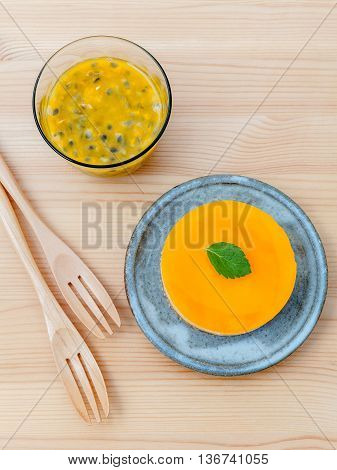 Passion Fruit Cheesecake With Fresh Mint Leaves On Wooden Background. Passion Fruit Cheesecake Setup