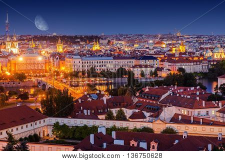 Old Town Prague at Night. Vltava River and the Manesuv Bridge. Prague Illuminated Cityscape. Czechia Czech Republic.
