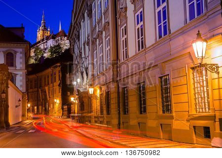 Prague Old Town Street with Illuminated Prague Castle Prazsky Hrad.