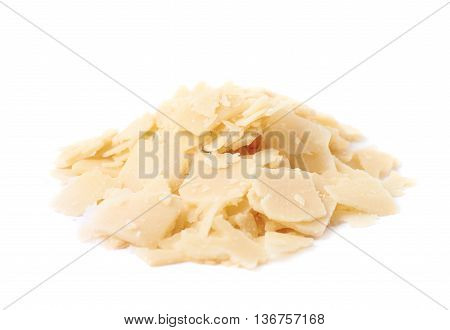 Pile of parmesan cheese flakes isolated over the white background