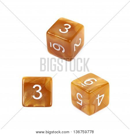 Roleplaying orange polyhedral gaming plastic dice cube isolated over the white background, set of three different foreshortenings