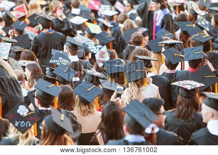 ATHENS, GA - MAY 2016: University of Georgia graduates wearing their mortarboards gather as they prepare for graduation activities in Athens GA on May 13 2016.