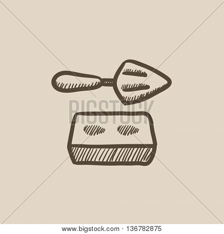 Spatula with brick vector sketch icon isolated on background. Hand drawn Spatula with brick icon. Spatula with brick sketch icon for infographic, website or app.