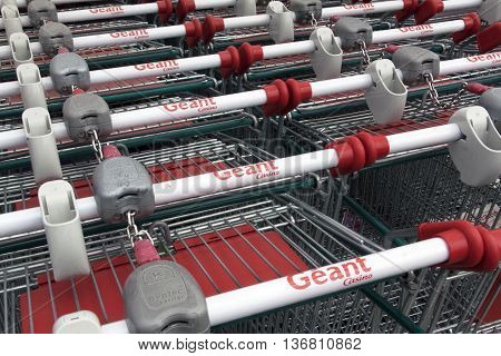 paris france-june 18 2016: letters geant casino on shopping carts