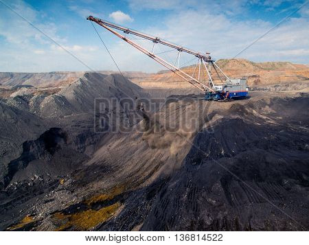 Dragline on open pit coal mine in Russia