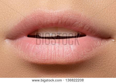 Part Of Face, Young Woman Close-up. Sexy Plump Lips Without Make-up
