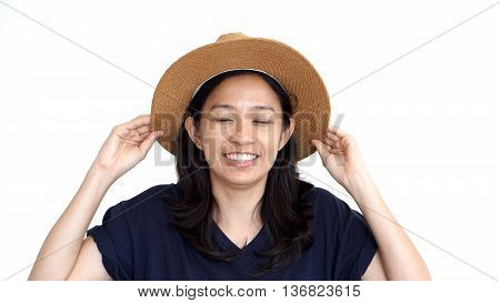 Casual Friendly Asian Girl Wearing Hat Relaxing And Smiling On Isolated Background