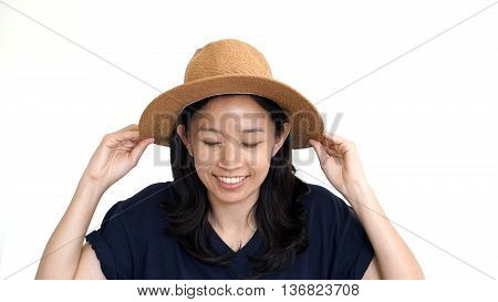 Casual Friendly Asian Girl Wearing Hat Relaxing And Smiling On Isolated Background