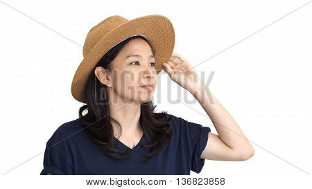 Casual Friendly Asian Girl Wearing Hat Relaxing And Smiling On Isolated Background