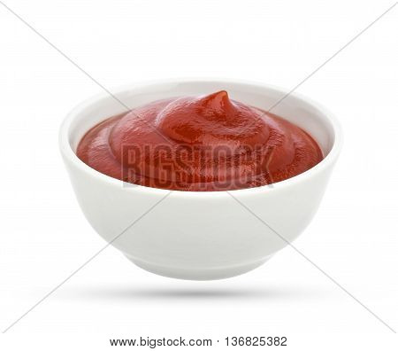 Ketchup in bowl isolated on white background. Portion of tomato sauce. With clipping path.