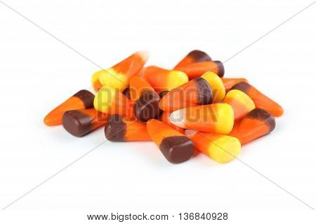 Halloween candy corns isolated on white, close up
