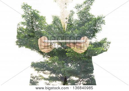 Double Exposure Of Businessman With Big Tree And Leaf As Business Network And Technology Concept