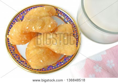 Chinese cruller and soy milk on white background