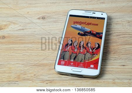KOTA KINABALU MALAYSIA - JULY 1 2016: Vietjet Air on mobile app the app helps managing travel plans make bookings check-in and choose seat anytime anywhere.