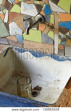 Sink ceramic tile mosaic kitchen equipment home interior.