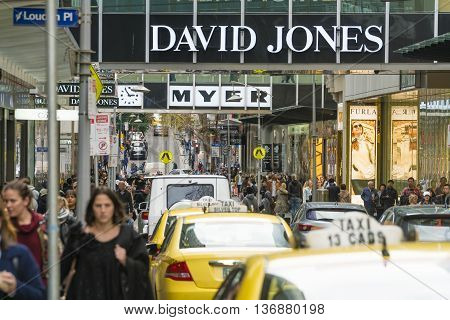 Melbourne, Australia - Jul 2, 2016: People walking along Little Bourke street in downtown Melbourne, Australia. It is a popular shopping area with major department stores such as Myer and David Jones.