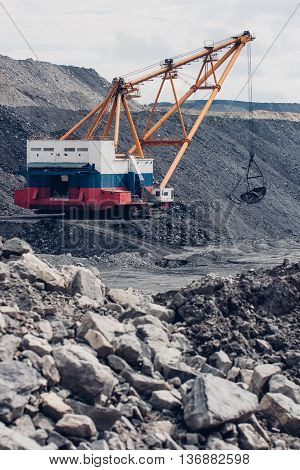 Dragline on open pit coal mine in Russia