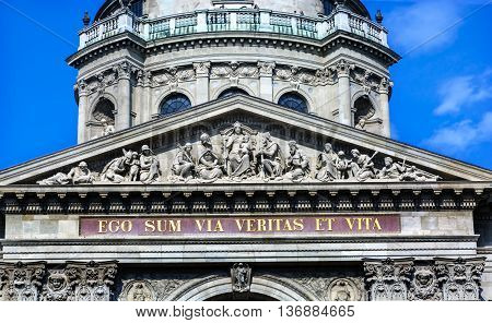 Facade Mary Jesus Statues Saint Stephens Cathedral Budapest Hungary. Latin Statement from Bible I am the Way the Truth and the Light. Cathedral built in the 1800s and consecrated in 1905.