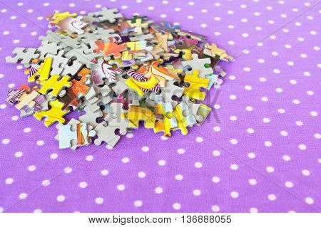 Jigsaw puzzles set on a lilac background. Jigsaw puzzles games for kids. Logic puzzles for children