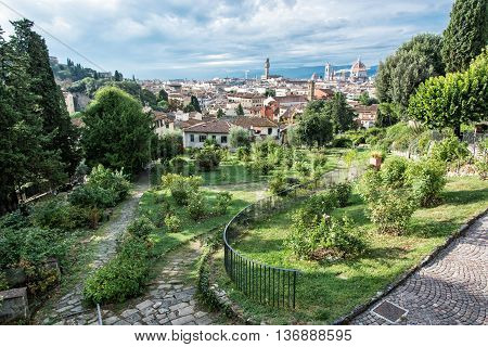 View from Giardino delle Rose to the city of Florence. Tuscany Italy. Travelling scene. Beautiful place. Greenery and town. Cradle of the renaissance. Cultural heritage.